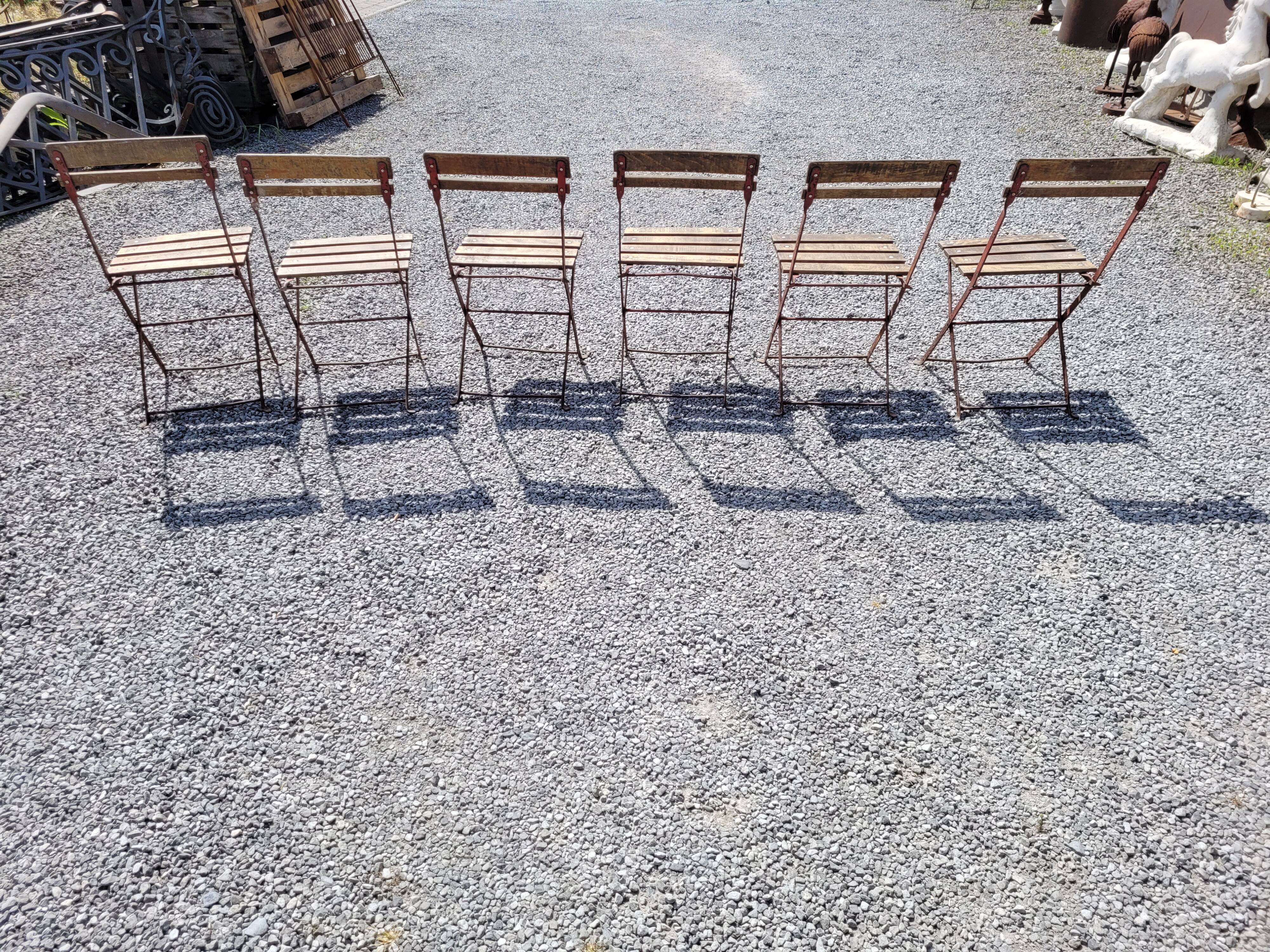 6 folding iron chairs and wooden seat