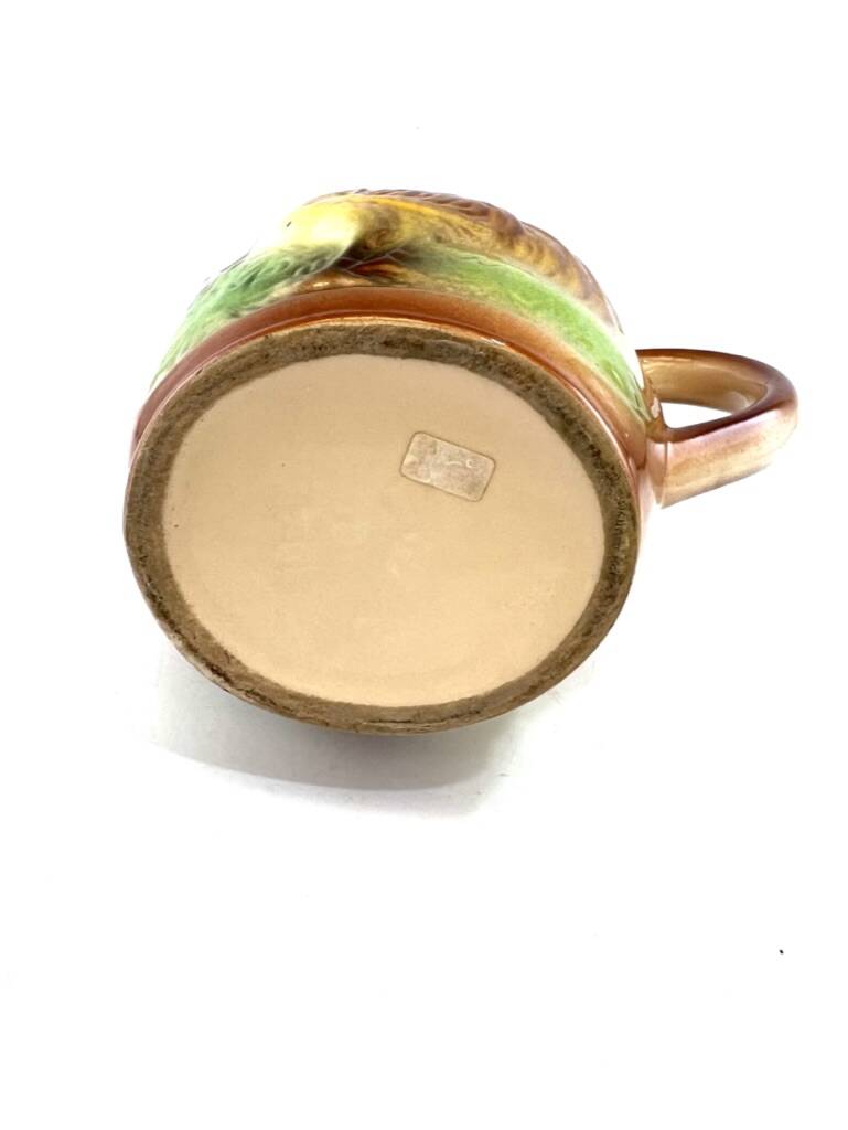 Slush pitcher with rooster decor