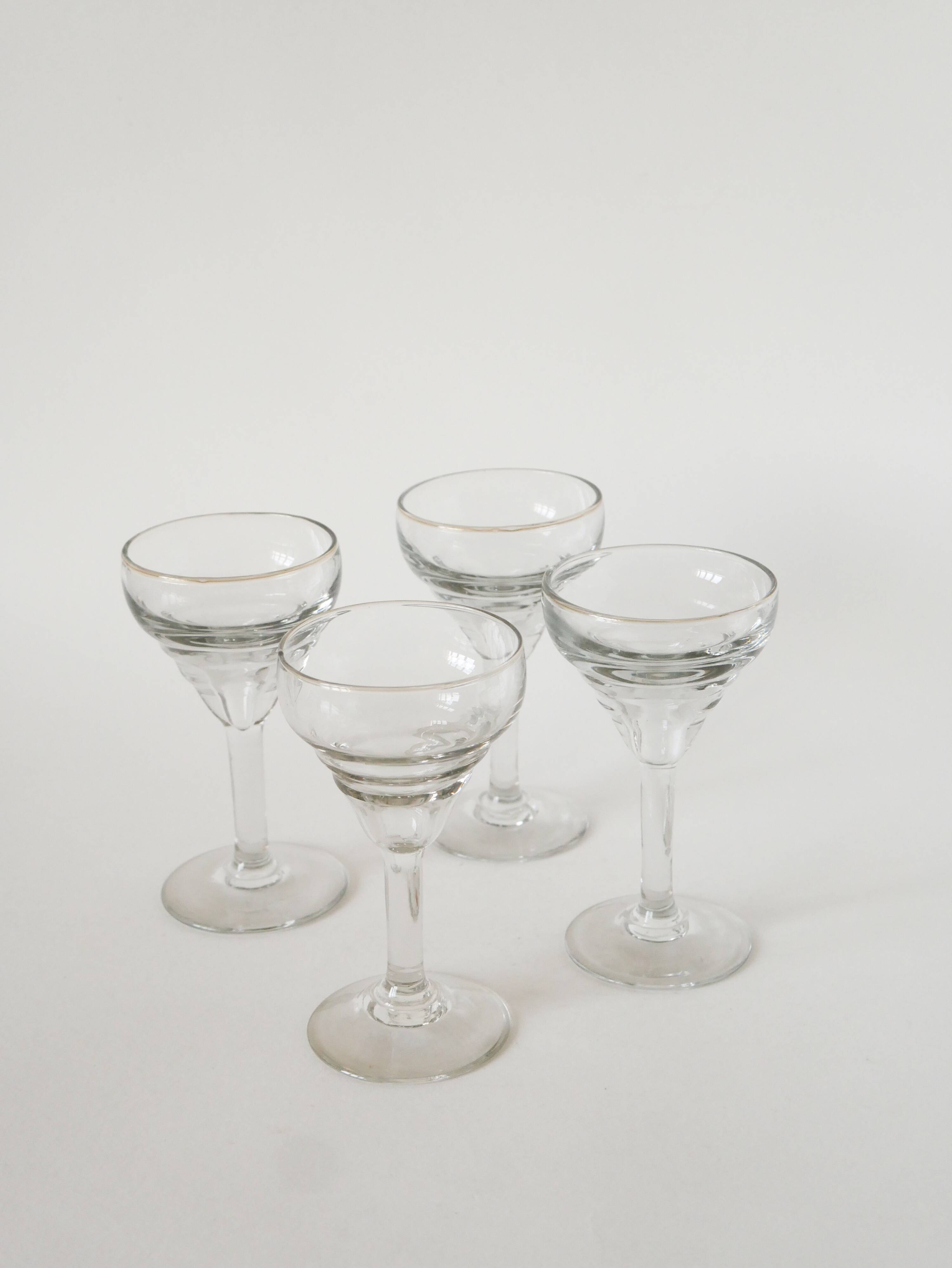 Set of 4 moulded glass wine glasses, 1920