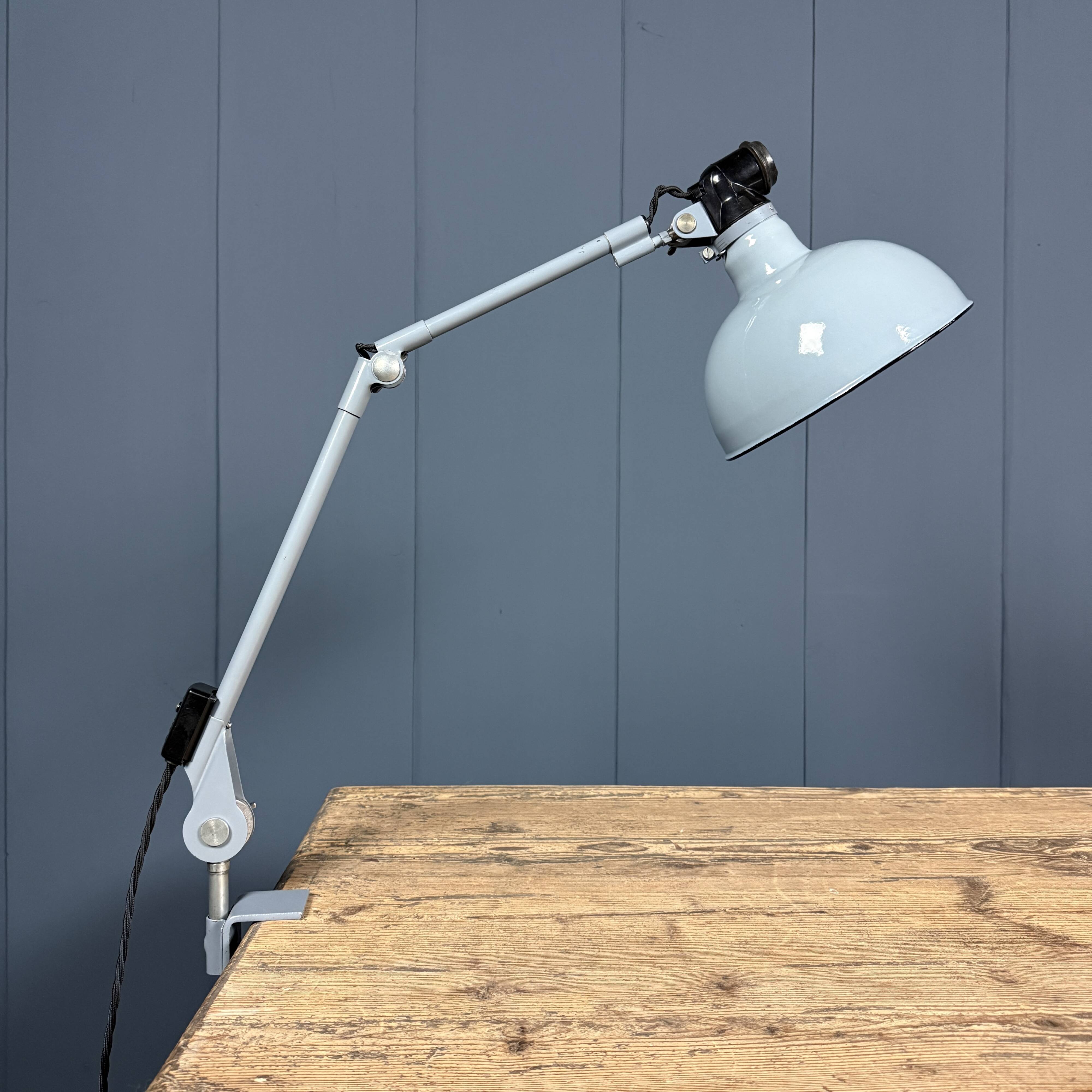 Light grey Rademacher clamp lamp with large enamel shade