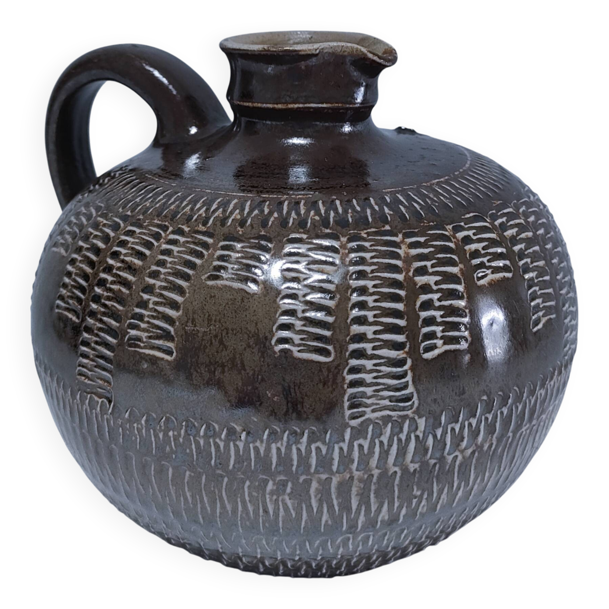 Vintage scarified glazed stoneware pitcher