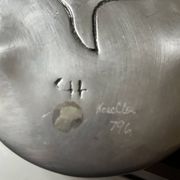vide poche en aluminium poli, signée et estampillée dans la masse