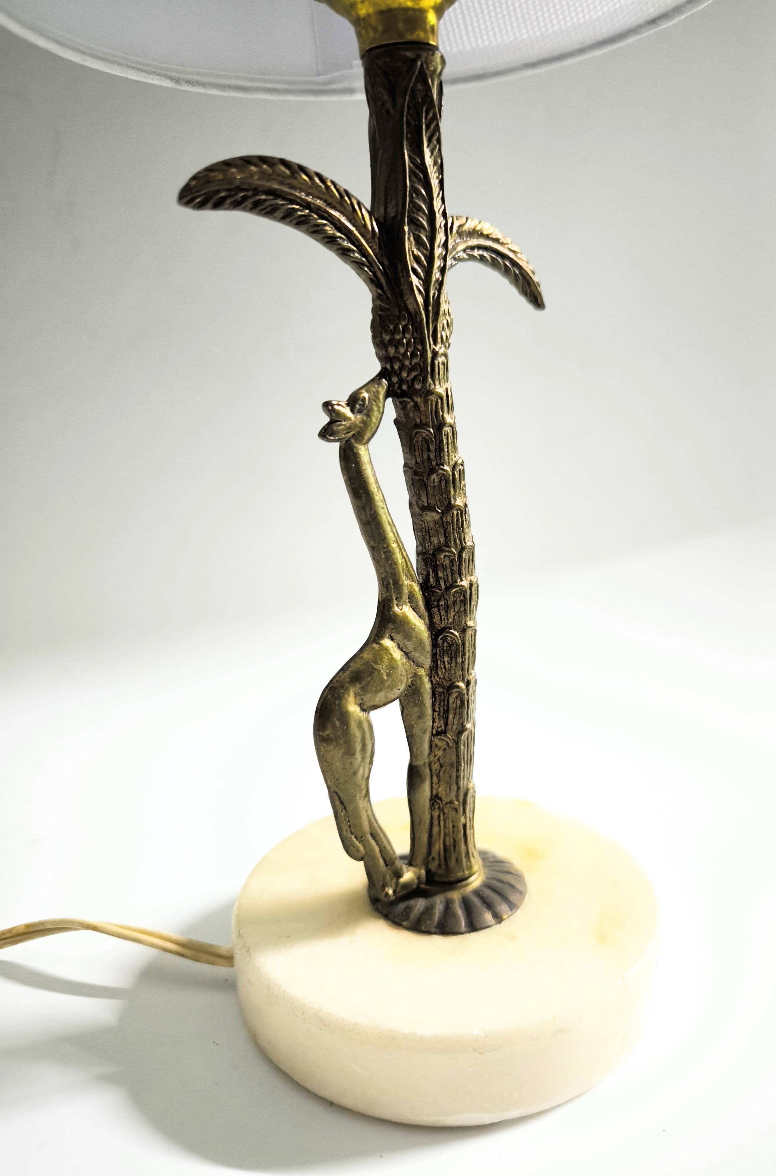 Bronze and marble lamp in Hollywood Regency style.