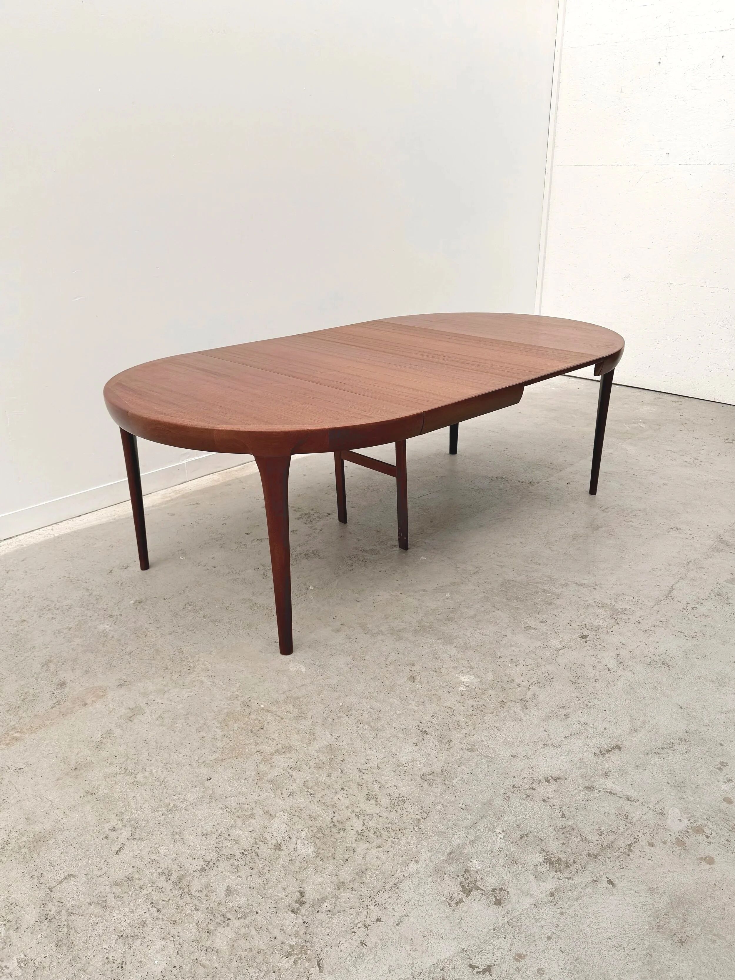 Dining table by Kofod Larsen for Faarup Mobelfabrik in teak, Denmark 1960.