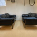 Pair of black leather sofas produced by Poltrona Frau, circa 1980/1990.