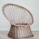 Antique armchair in gray woven wicker