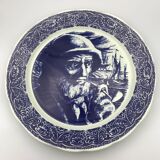 Blue enamelled earthenware wall plate with fisherman decor, Boch La Louvière, Belgium