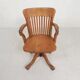 Oak office chair with adjustable spring system and height adjustment, 1950s.