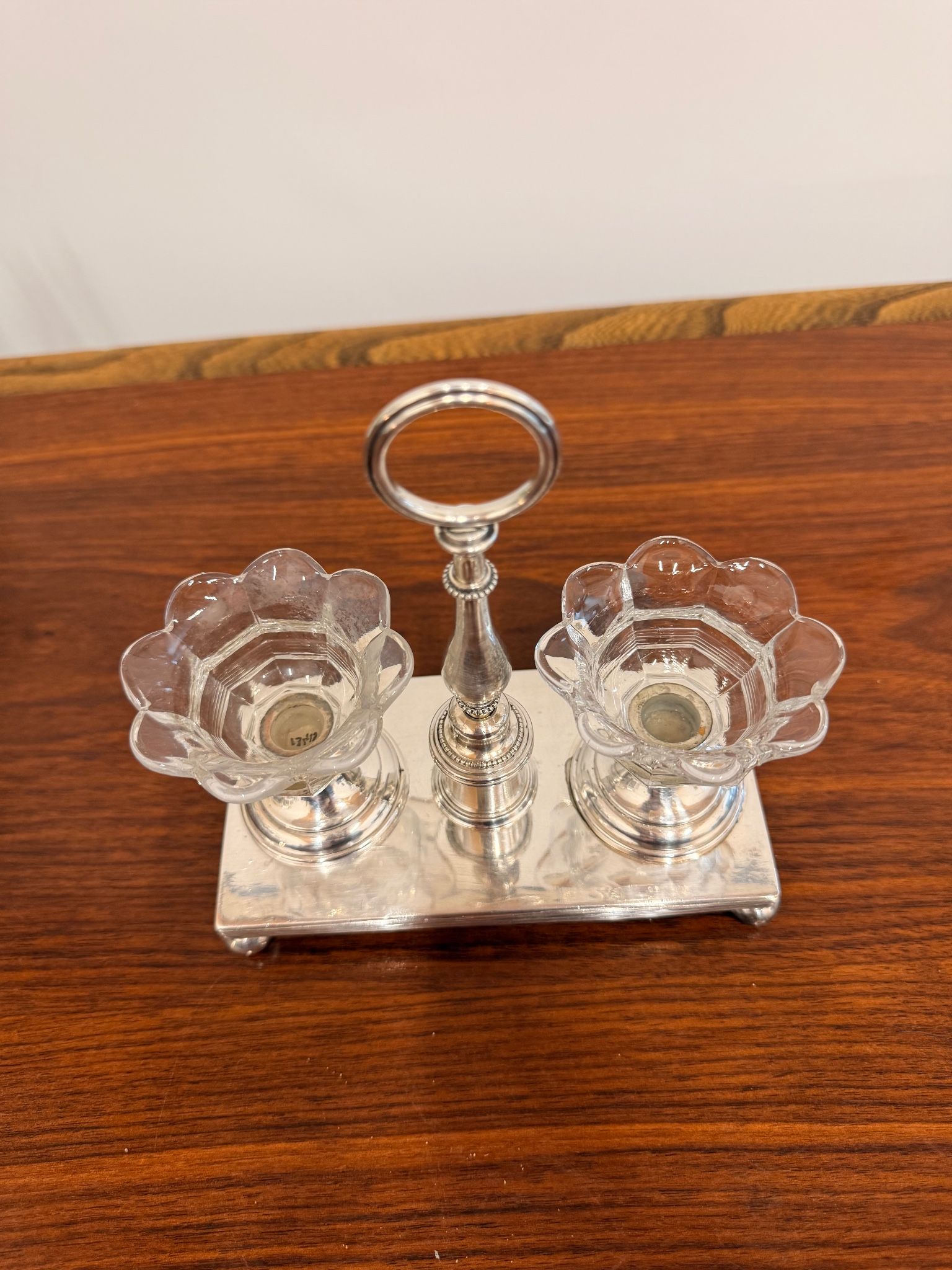Vintage silver-plated salt and pepper shaker set in crystal.