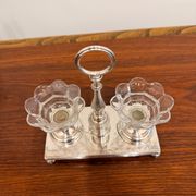 Vintage silver-plated salt and pepper shaker set in crystal.