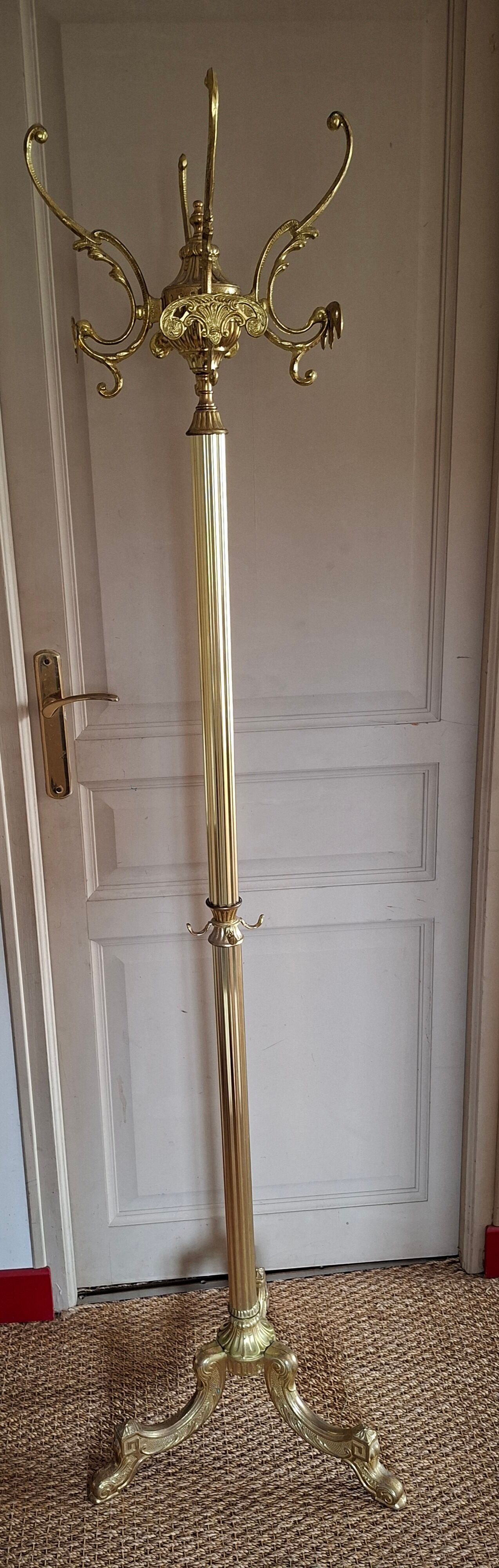 Golden parrot coat rack