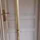 Golden parrot coat rack