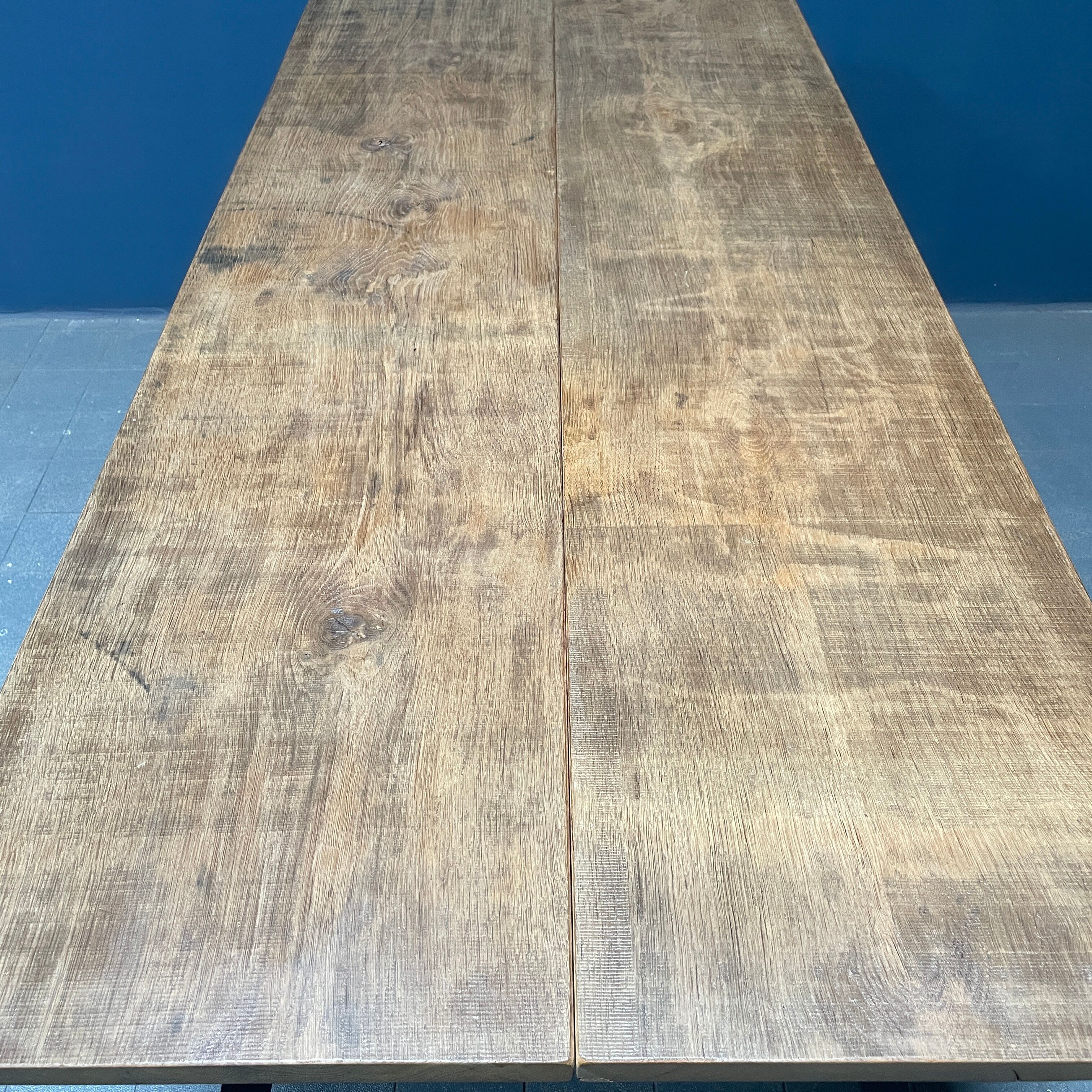 Handmade industrial oak dining table with black metal legs