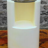 Cylindrical fiberglass bedside table from the 60s