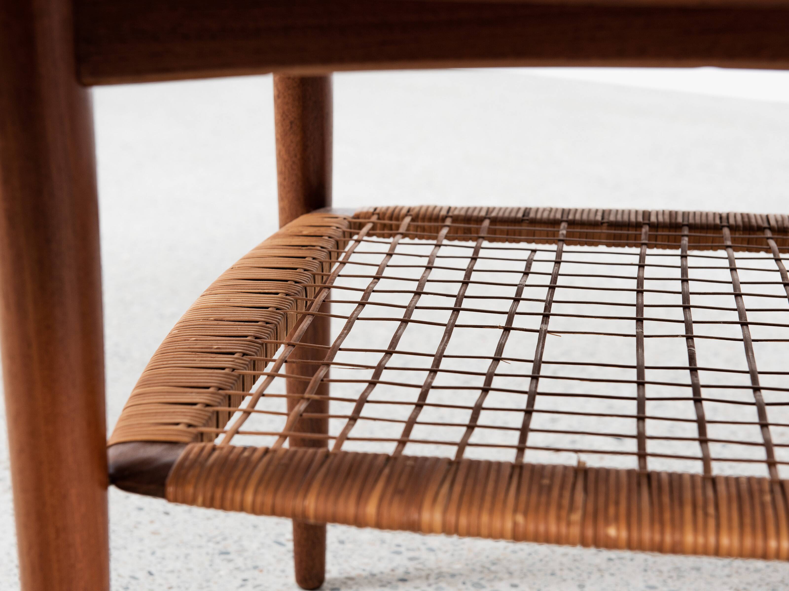 Midcentury Danish round coffee table in teak and cane by Johannes Andersen for Silkeborg 1960s
