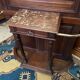 Porte-manteau de vestibule en noyer massif avec miroir ovale et patères en bronze