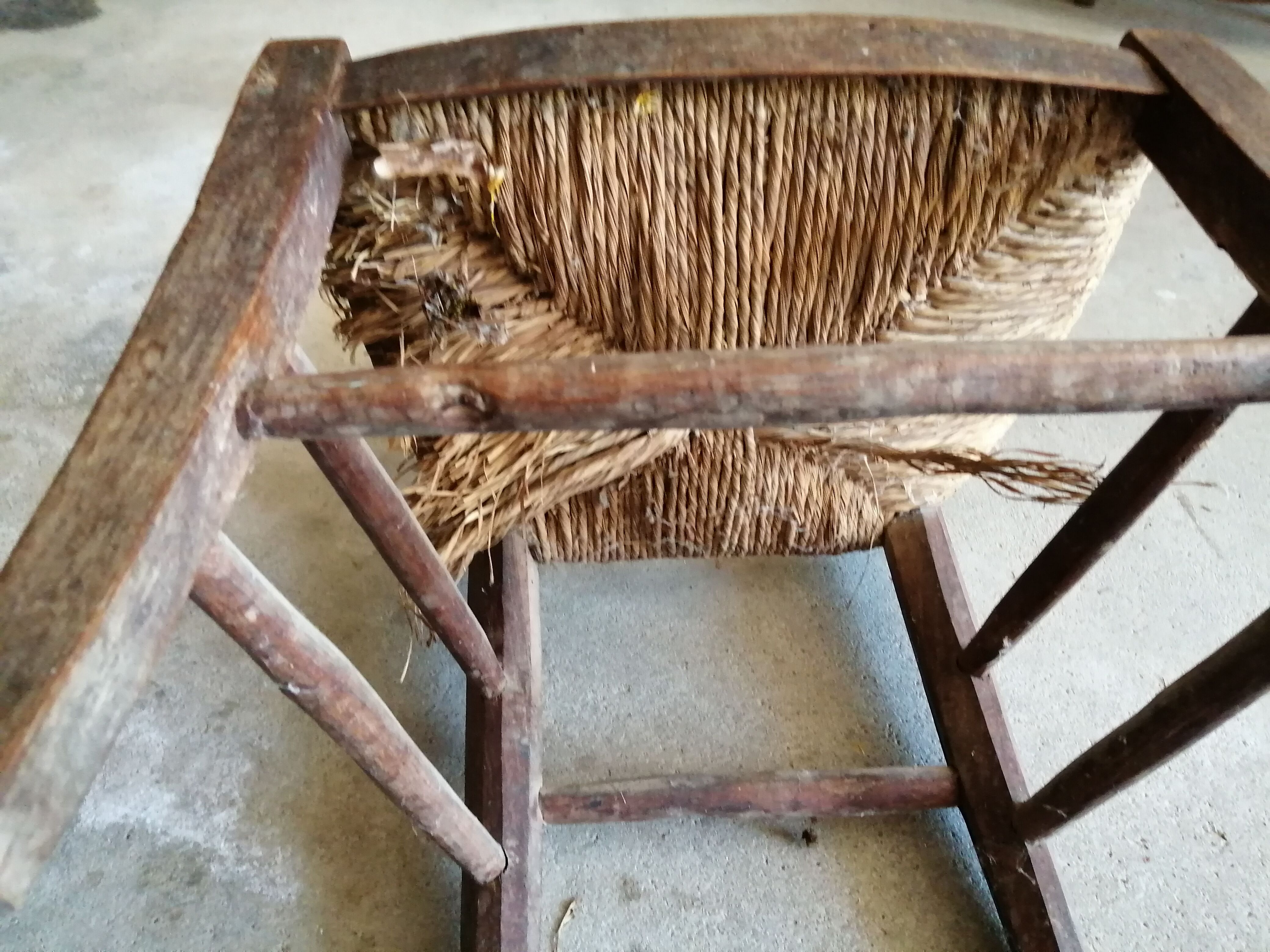 Low straw chair called "nurse"