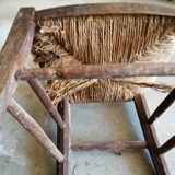 Low straw chair called "nurse"