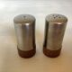 Salt and pepper set in teak and metal, Scandinavian style.