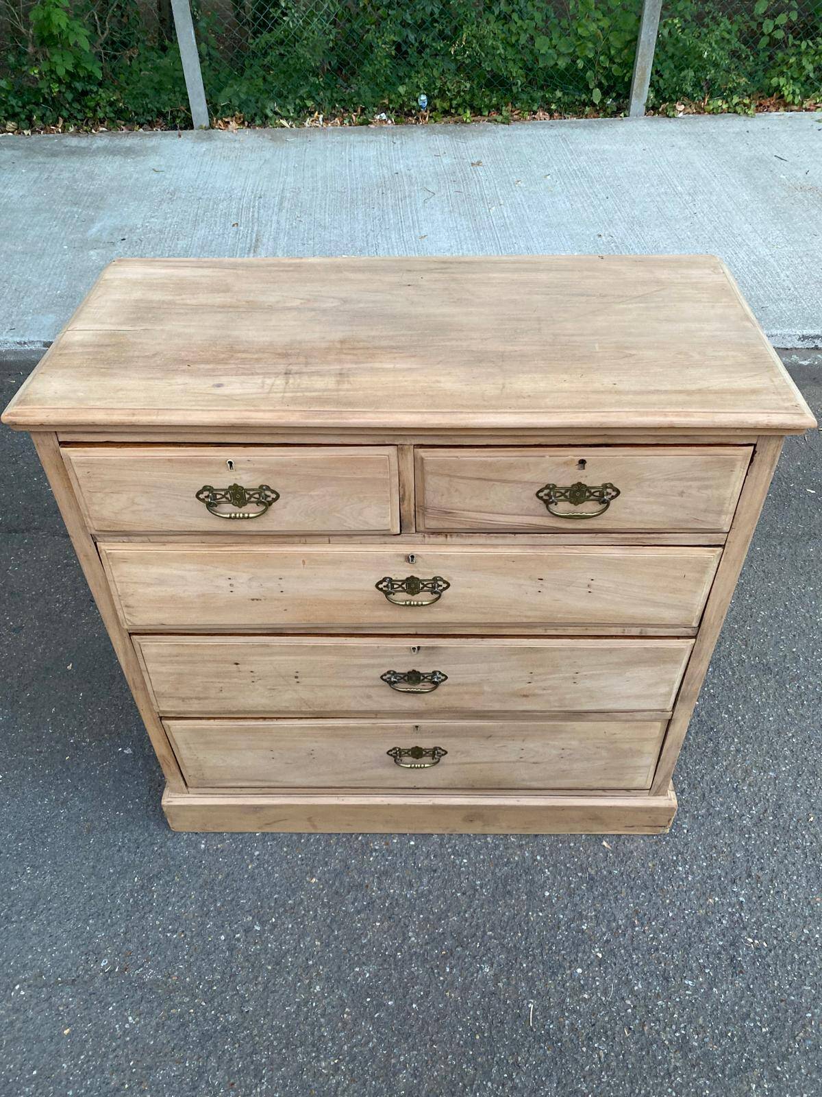 English stripped commode made of solid raw wood from the 19th century.