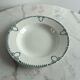 Céranord Saint Amand deep plate with green crown decoration.