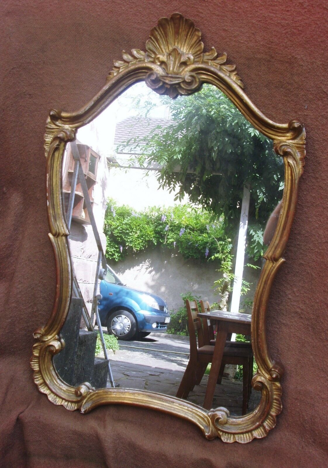 Louis XV-style golden mirror