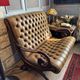 Canapé capitonné style Chesterfield