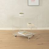 Wonderful side table from the 1960s, high-quality frame and shelf made of transparent acrylic with chrome-plated castors