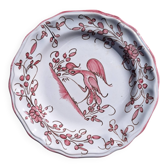 Assiette en faïence à décor d'oiseau