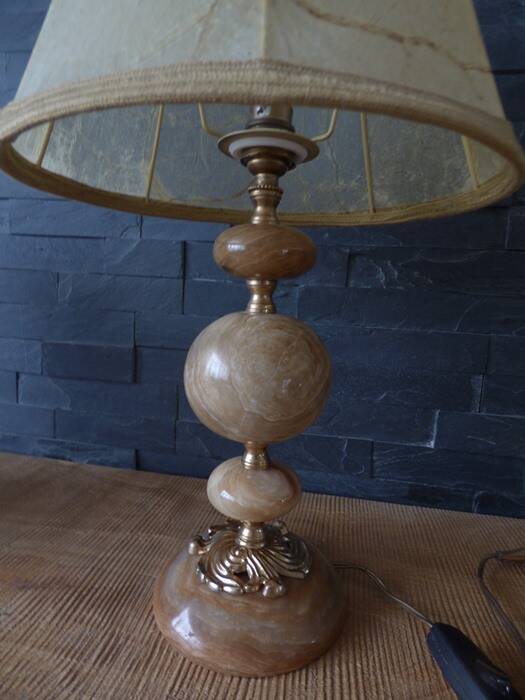Lamp with base in polished beige-brown stones and its leather lampshade