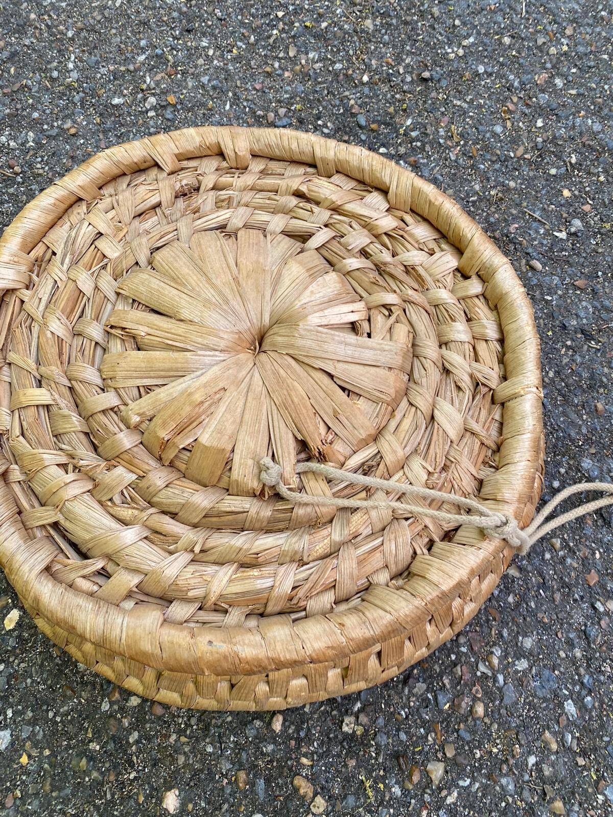 Round basket woven from banana fibre.