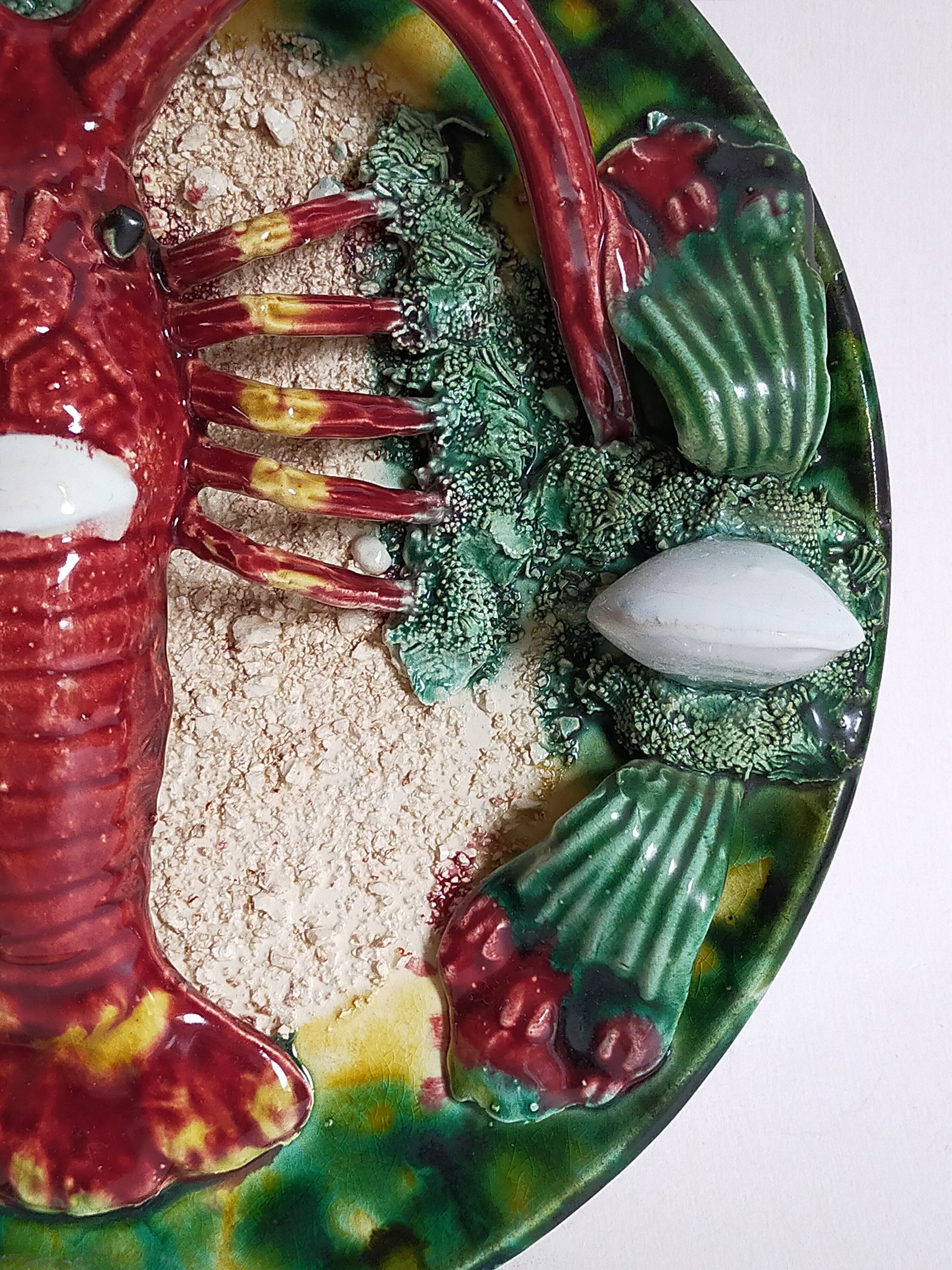 Plate in old barbotine with lobster