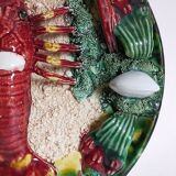 Plate in old barbotine with lobster