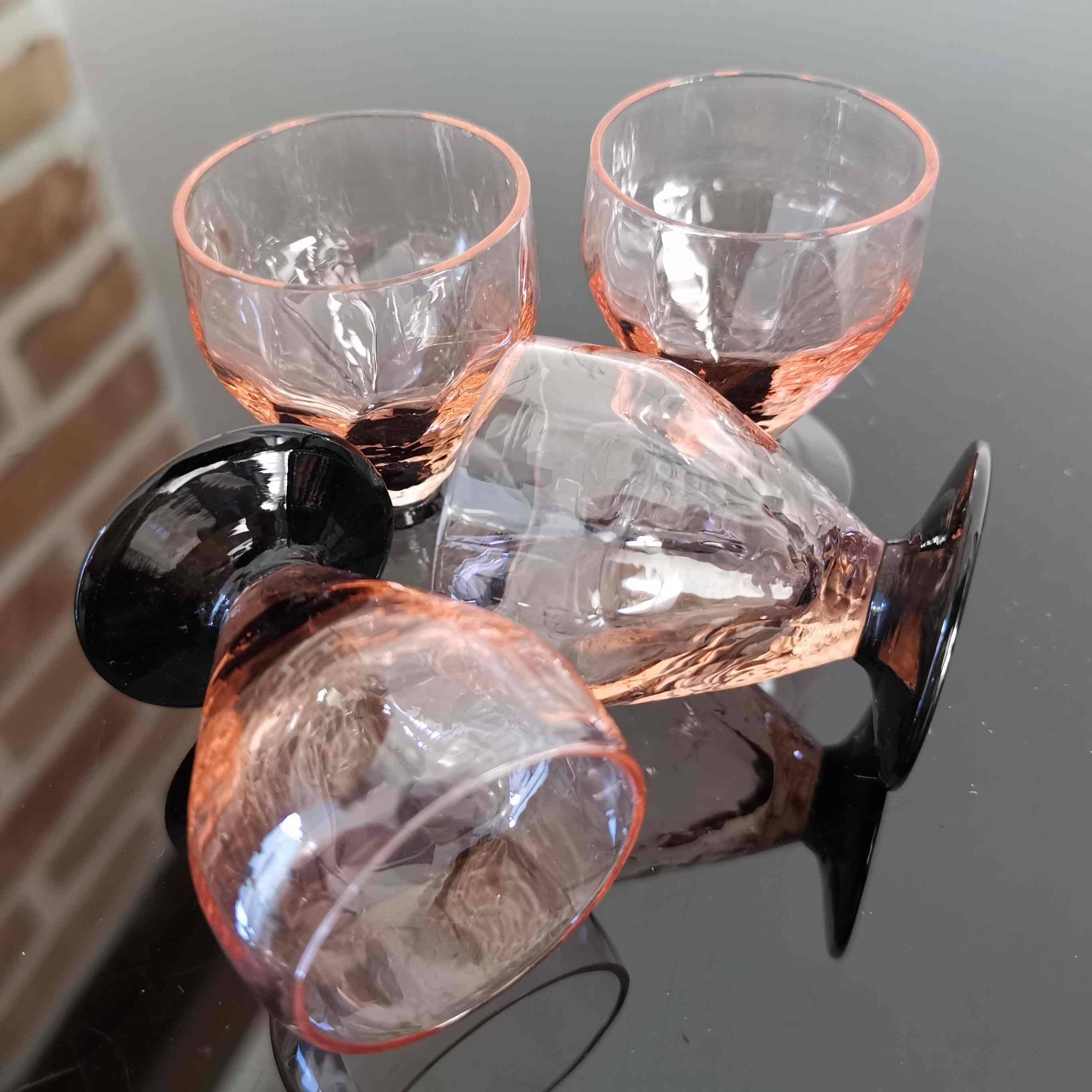 4 art deco liqueur glasses in smoked salmon glass with black base