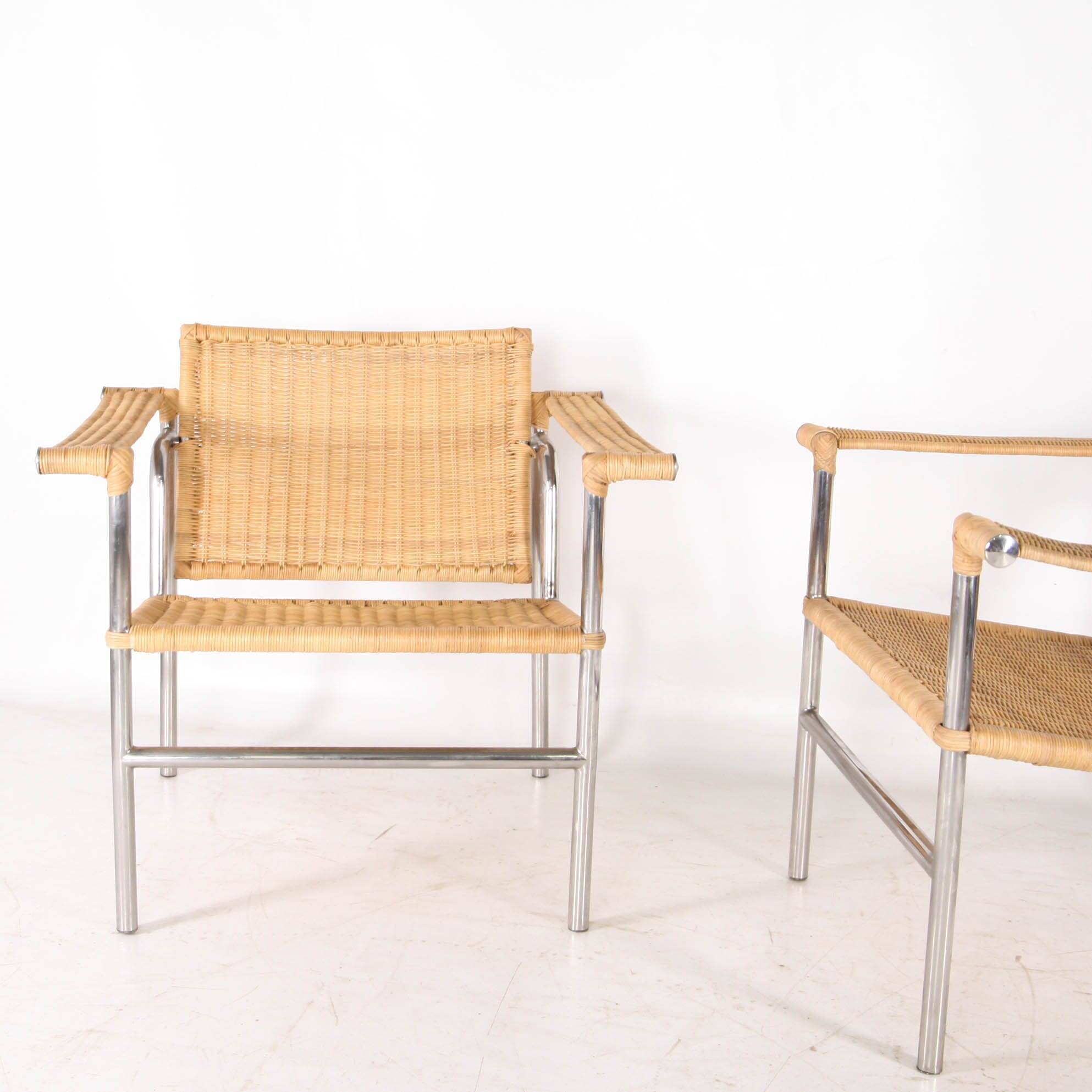 Pair of wicker and chrome armchairs