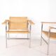 Pair of wicker and chrome armchairs