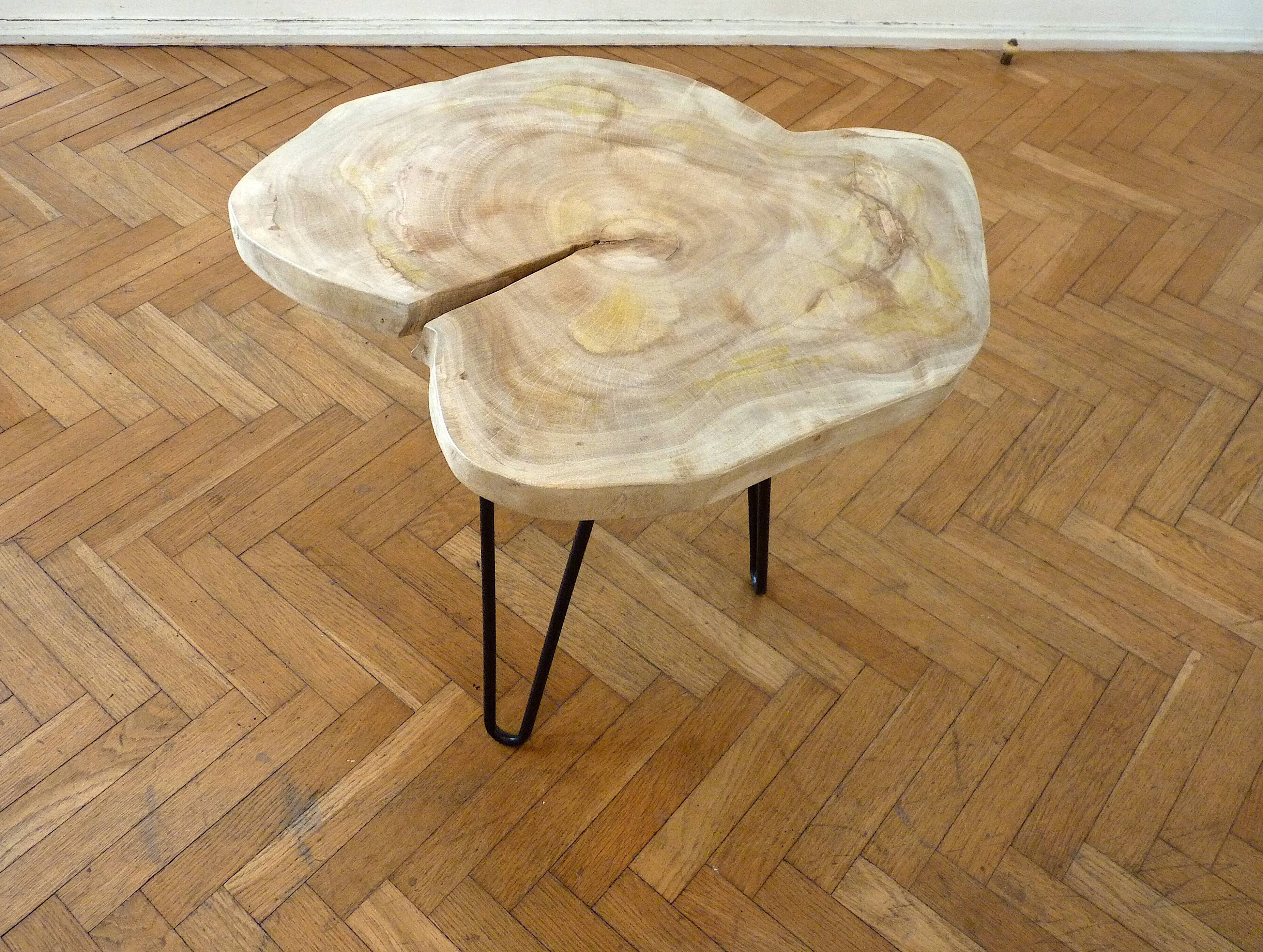 Coffee table in raw wood marbled appearance