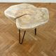 Coffee table in raw wood marbled appearance