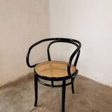 Curved wood and cane armchair called "Le Corbusier"