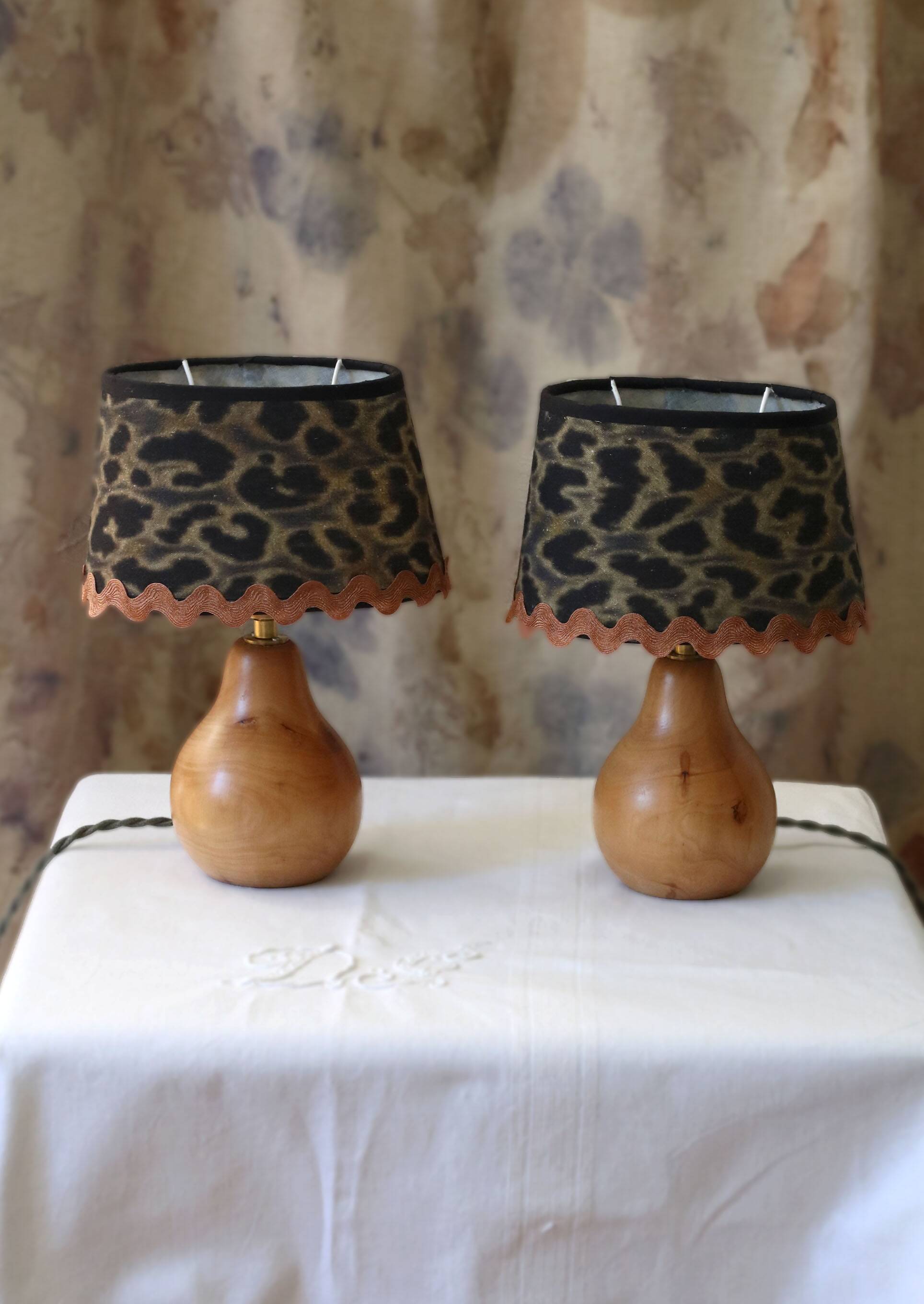 Pair of pear wood bedside lamps with leopard shades