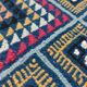 Tapis bleu à motifs multicolores tissés mains en laine naturelle