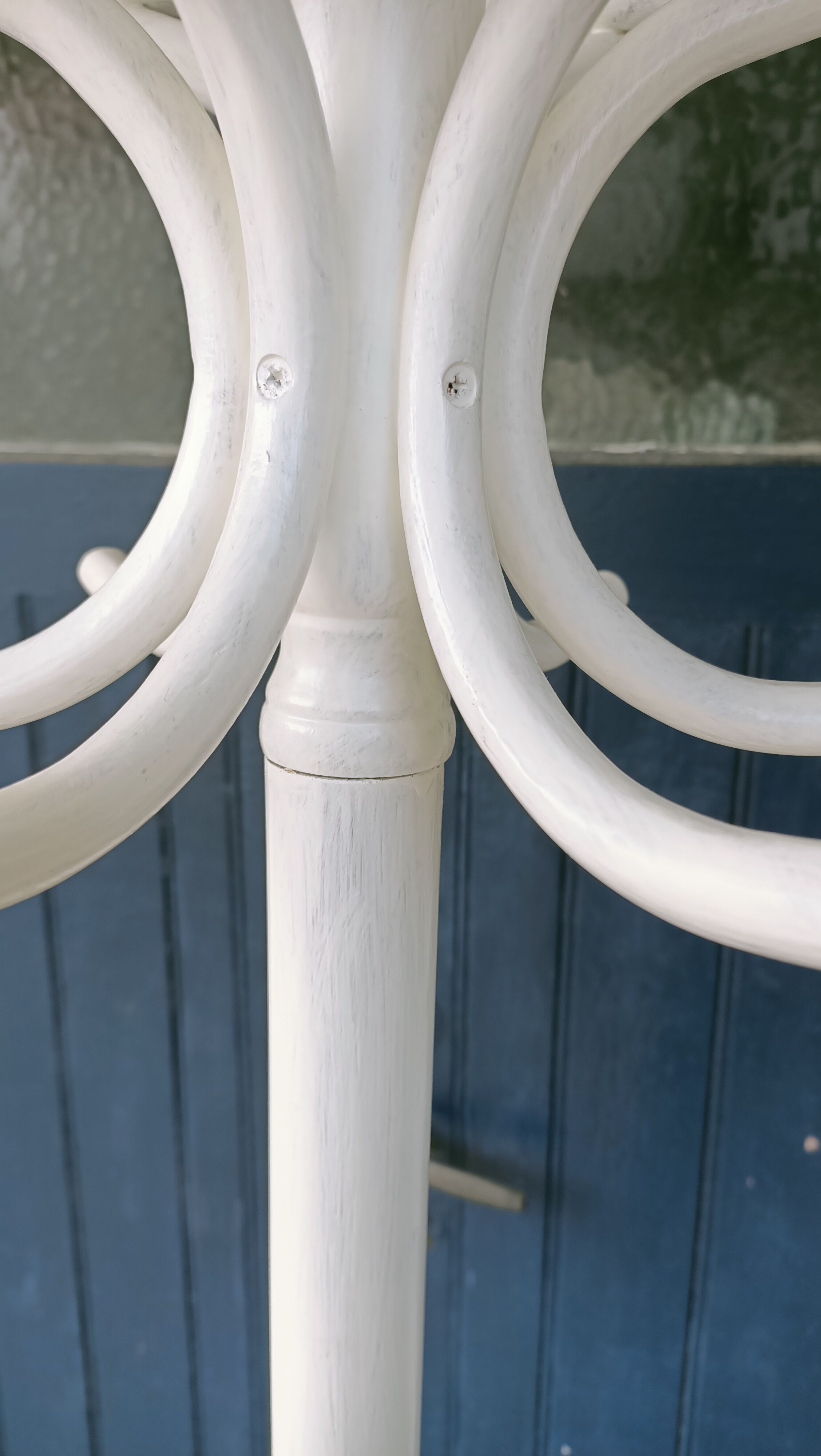 White parrot coat rack
