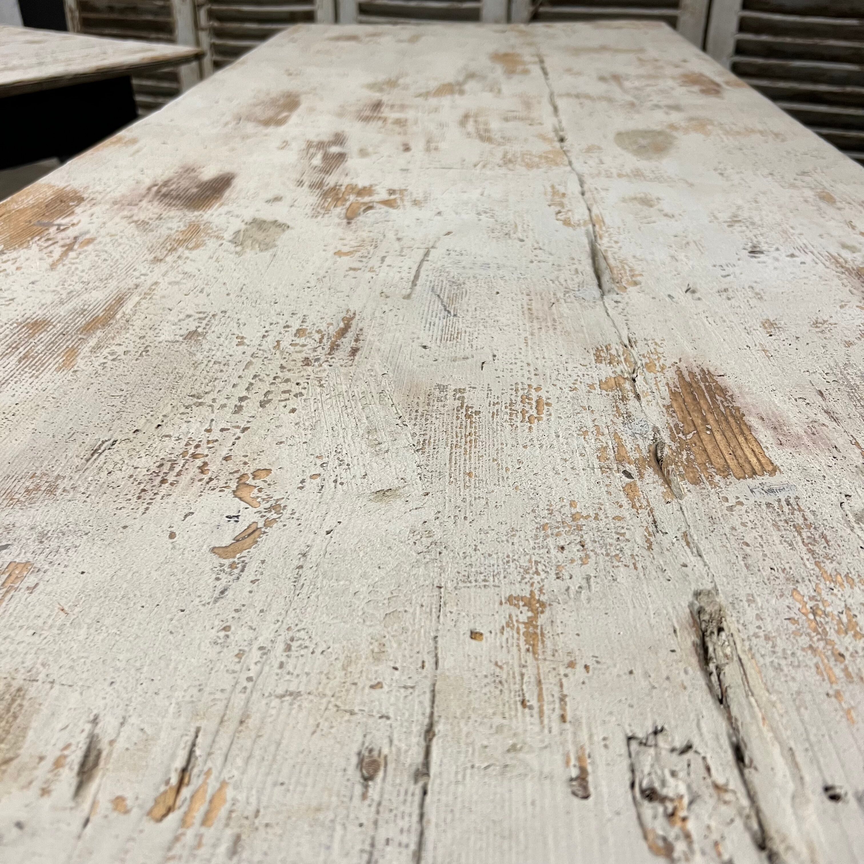 Black farmhouse table and white patinated top