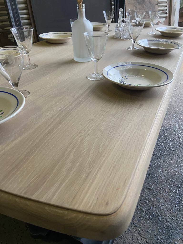 Raw wood table with black legs