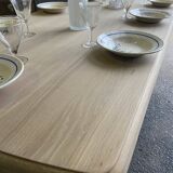 Raw wood table with black base