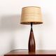Danish keel-shaped table lamp in teak and ebony by Fog & Morup.