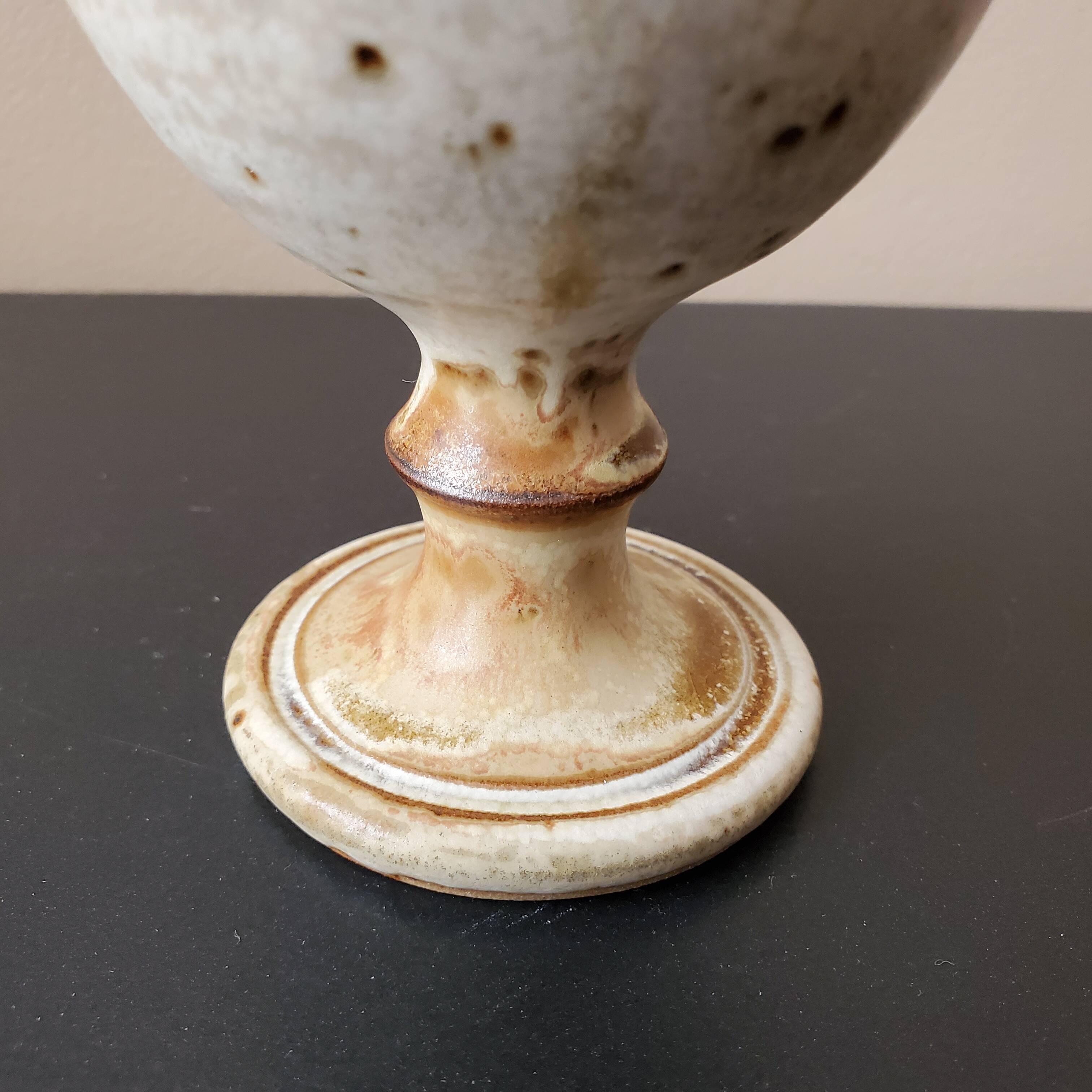 Old glazed sandstone chalice glass
