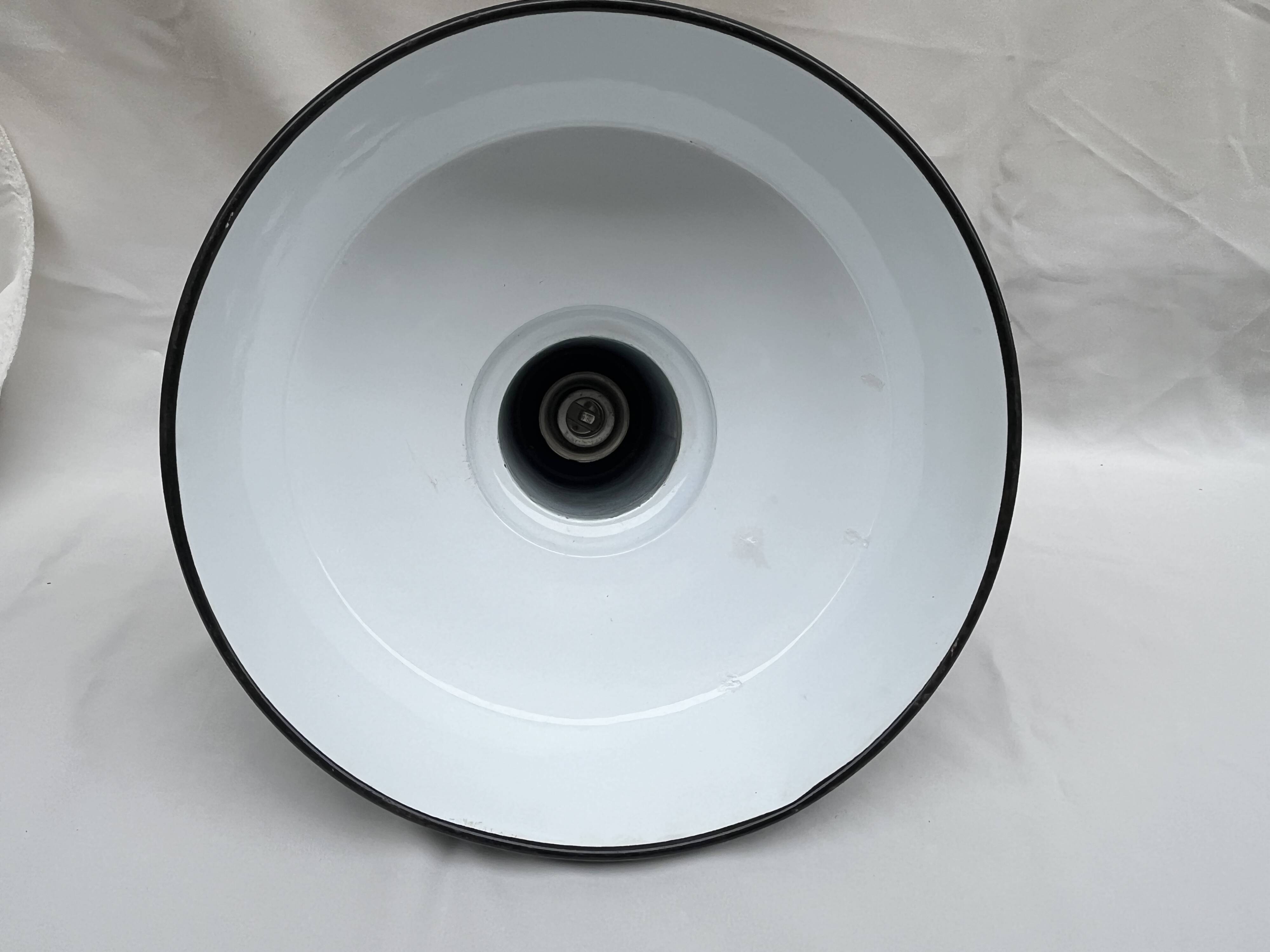 Industrial pendant light in black and white enamelled sheet metal factory bowl