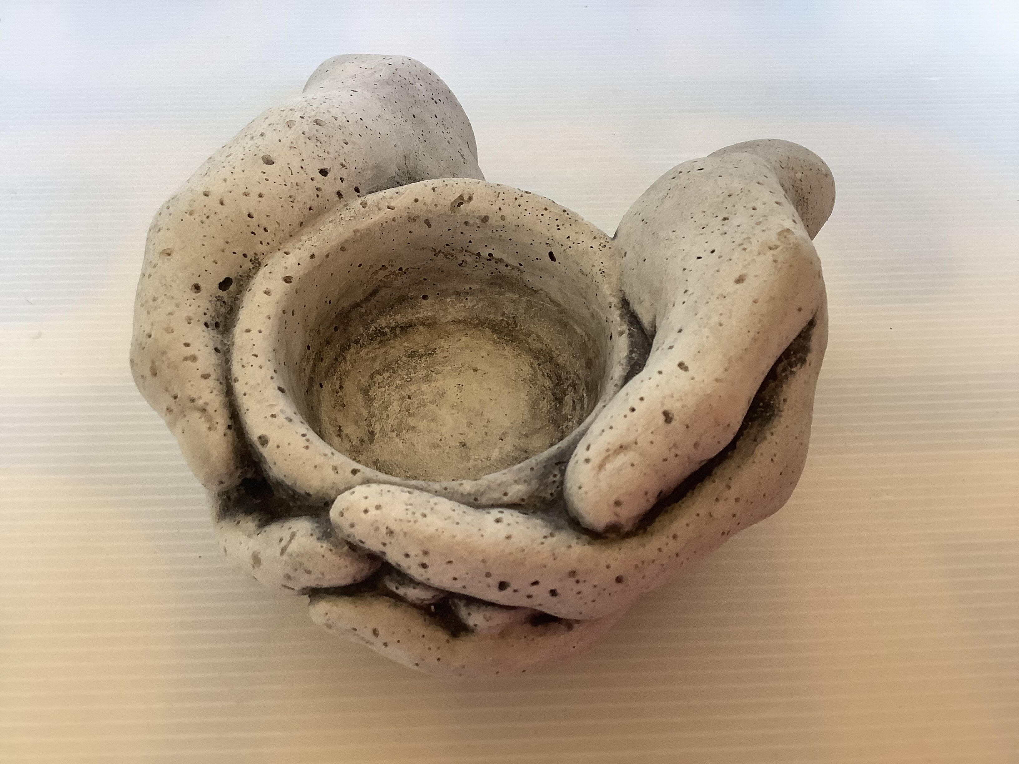 Hand candle holder gray black stone
