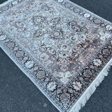 Hand-knotted Persian silk rug